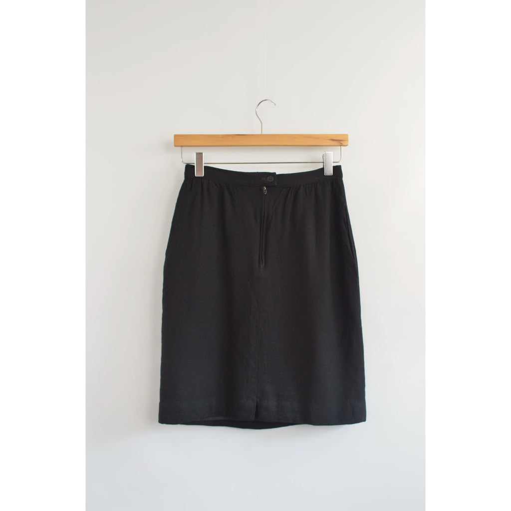 fully lined knee length black wool skirt with pockets
