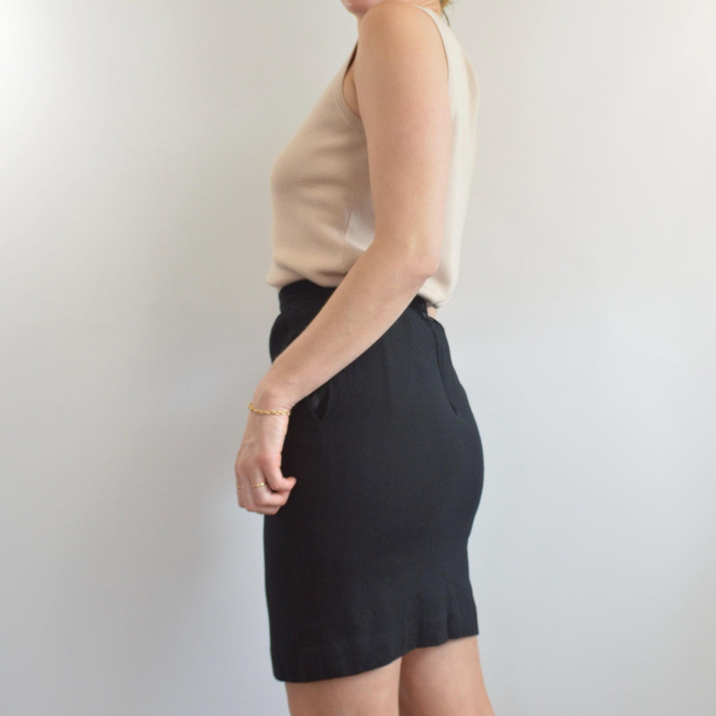 fully lined knee length black wool skirt with pockets