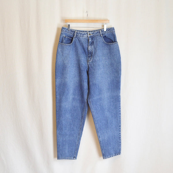 35” mid wash high rise tapered jeans