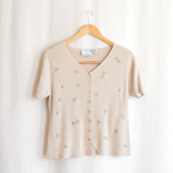 beige button down sweater tee with sage floral embroidery details