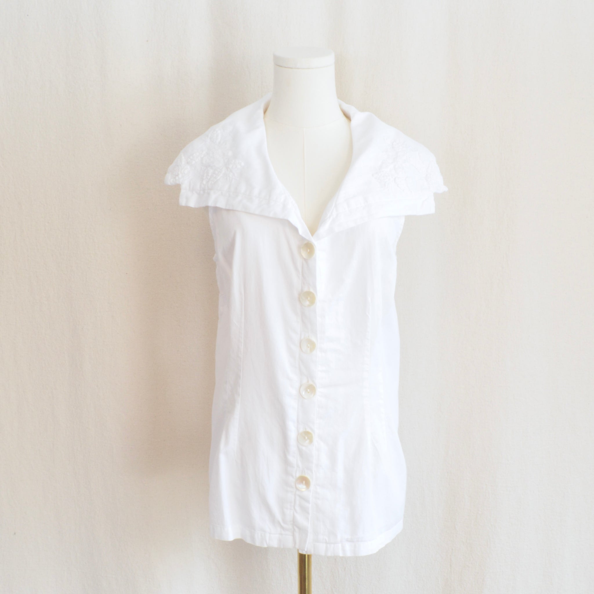 white cotton april cornell embroidered tie back sleeveless top