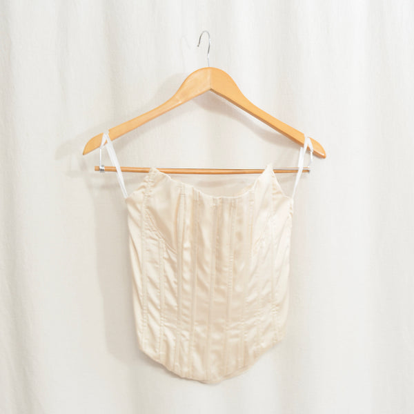 fitted ivory satin bustier with bust accent stitching