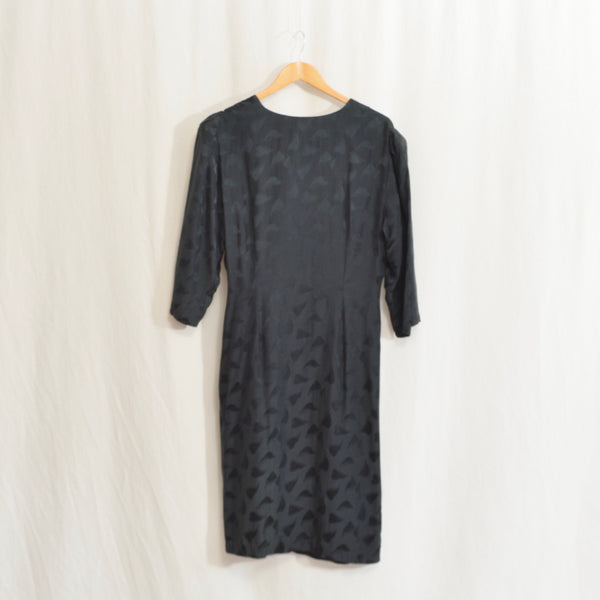 black sophisticates extra low cut draped pure silk leaf dress