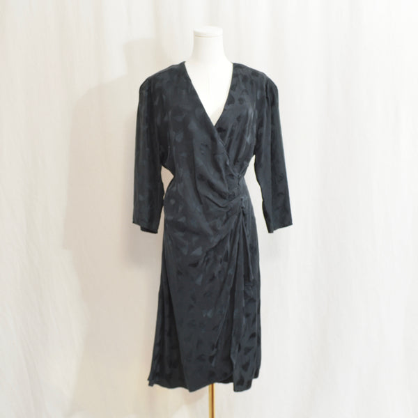 black sophisticates extra low cut draped pure silk leaf dress
