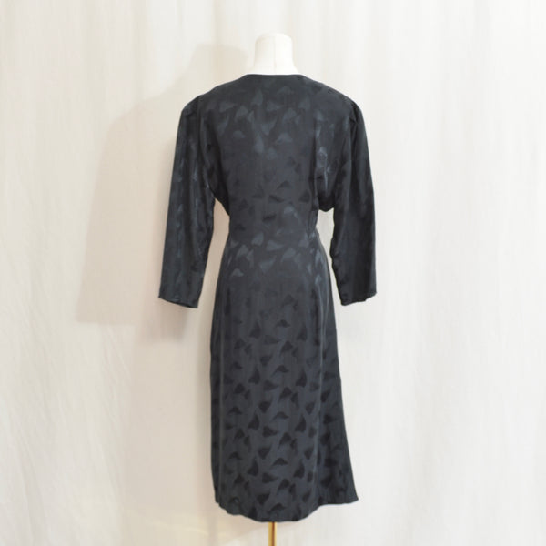 black sophisticates extra low cut draped pure silk leaf dress