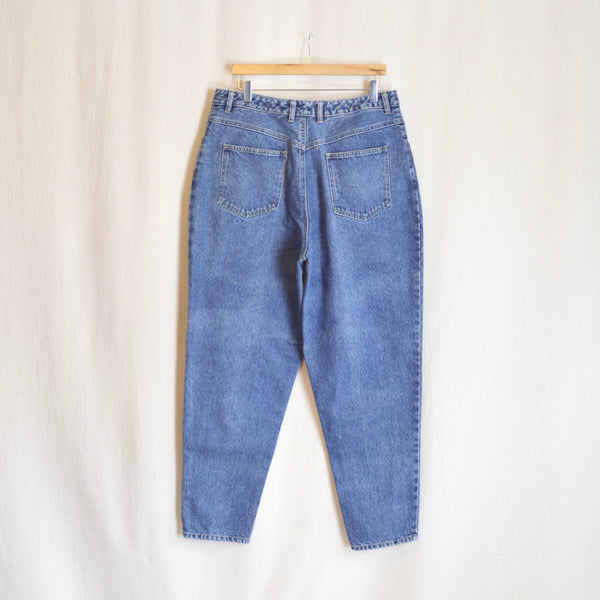 35” mid wash high rise tapered jeans
