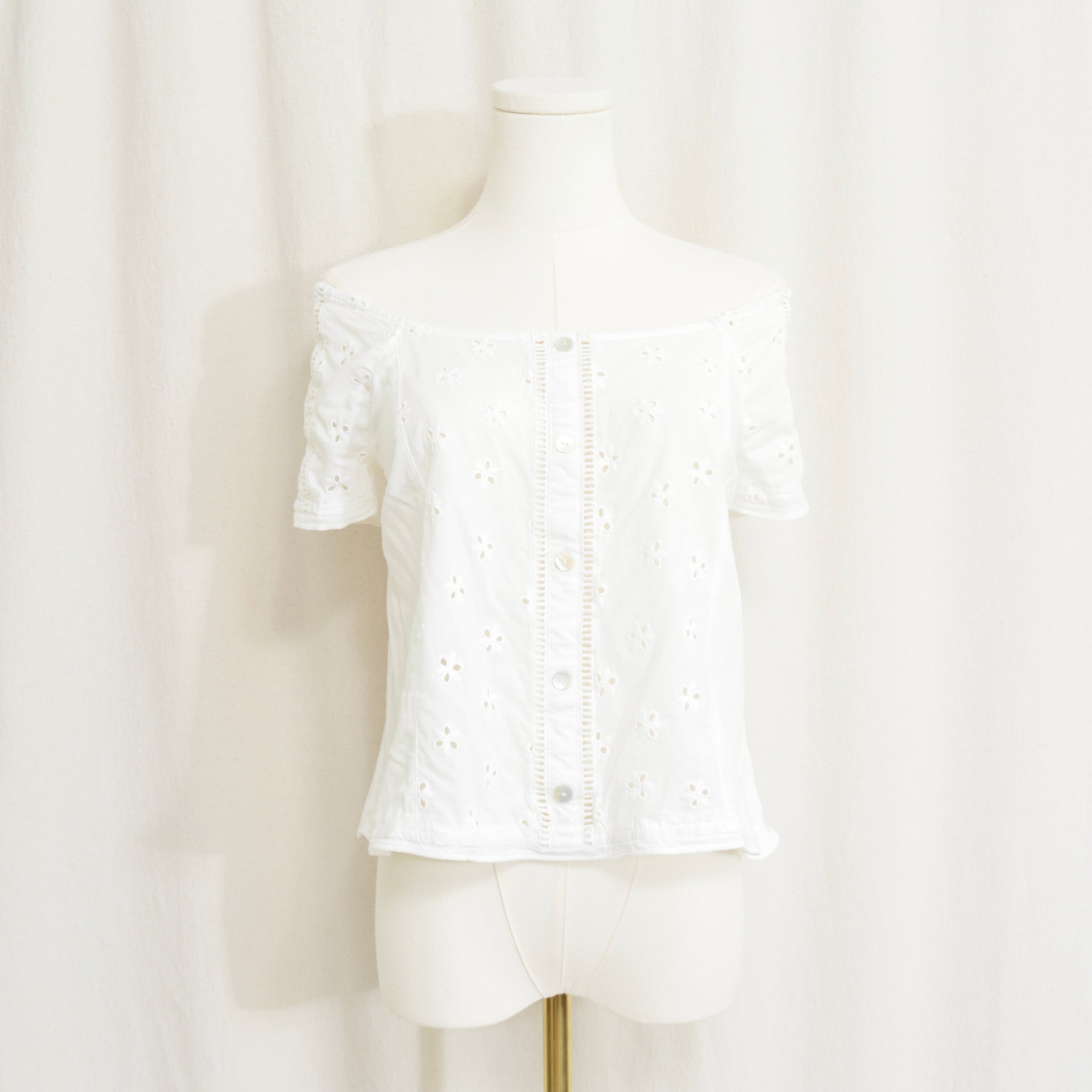 white vintage eyelet off the shoulder button down crop blouse