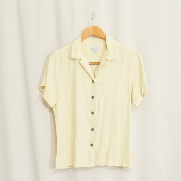 simple buttercream yellow button down short sleeve silk blouse