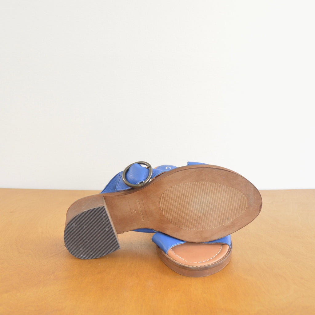 blue leather cross over block heels