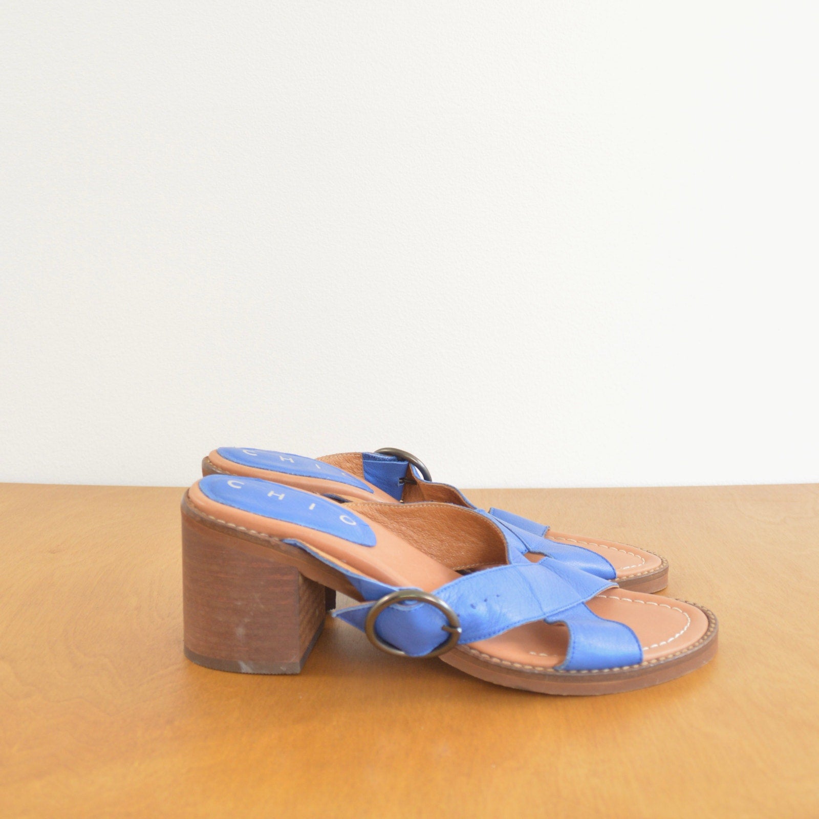 blue leather cross over block heels
