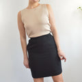 fully lined knee length black wool skirt with pockets
