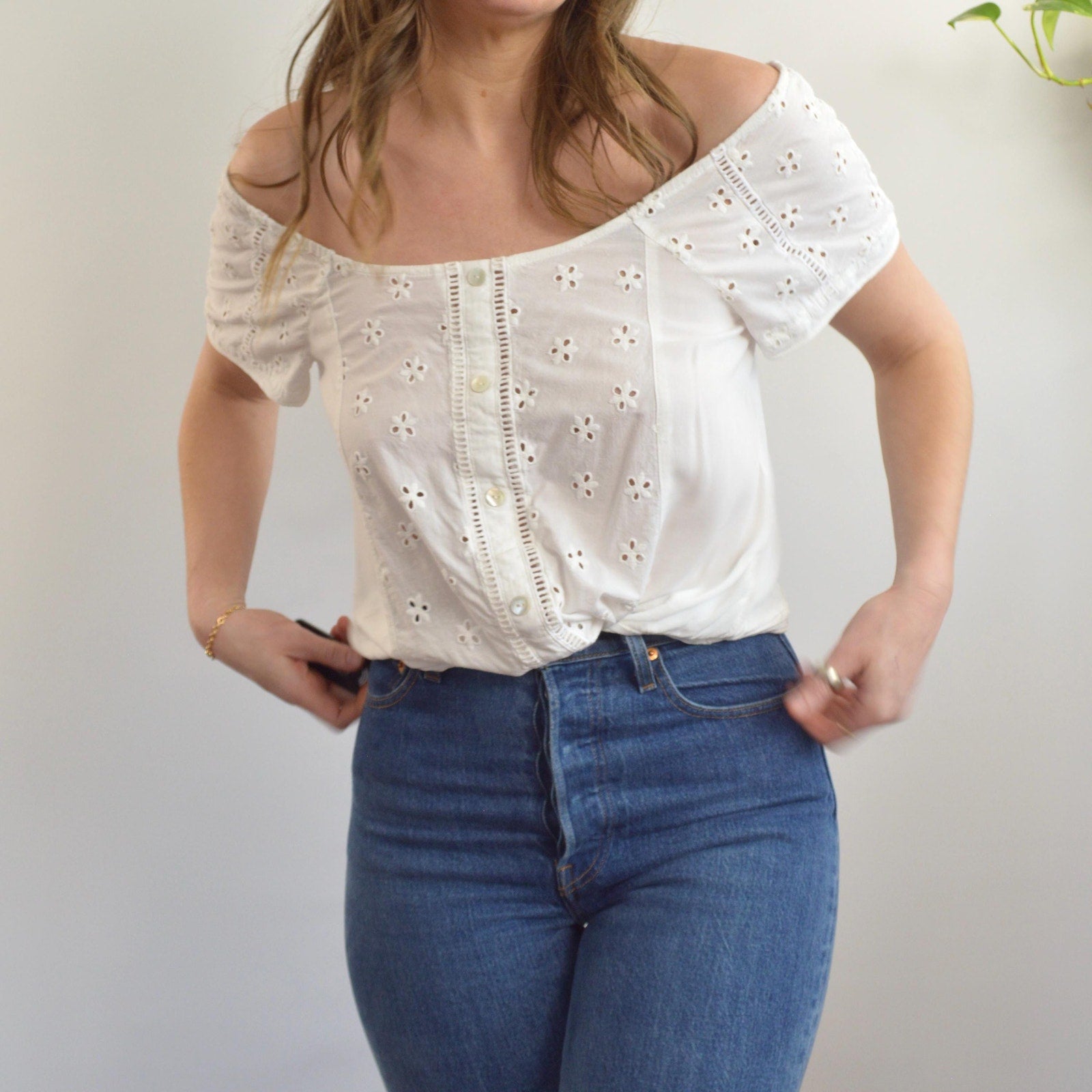 white vintage eyelet off the shoulder button down crop blouse