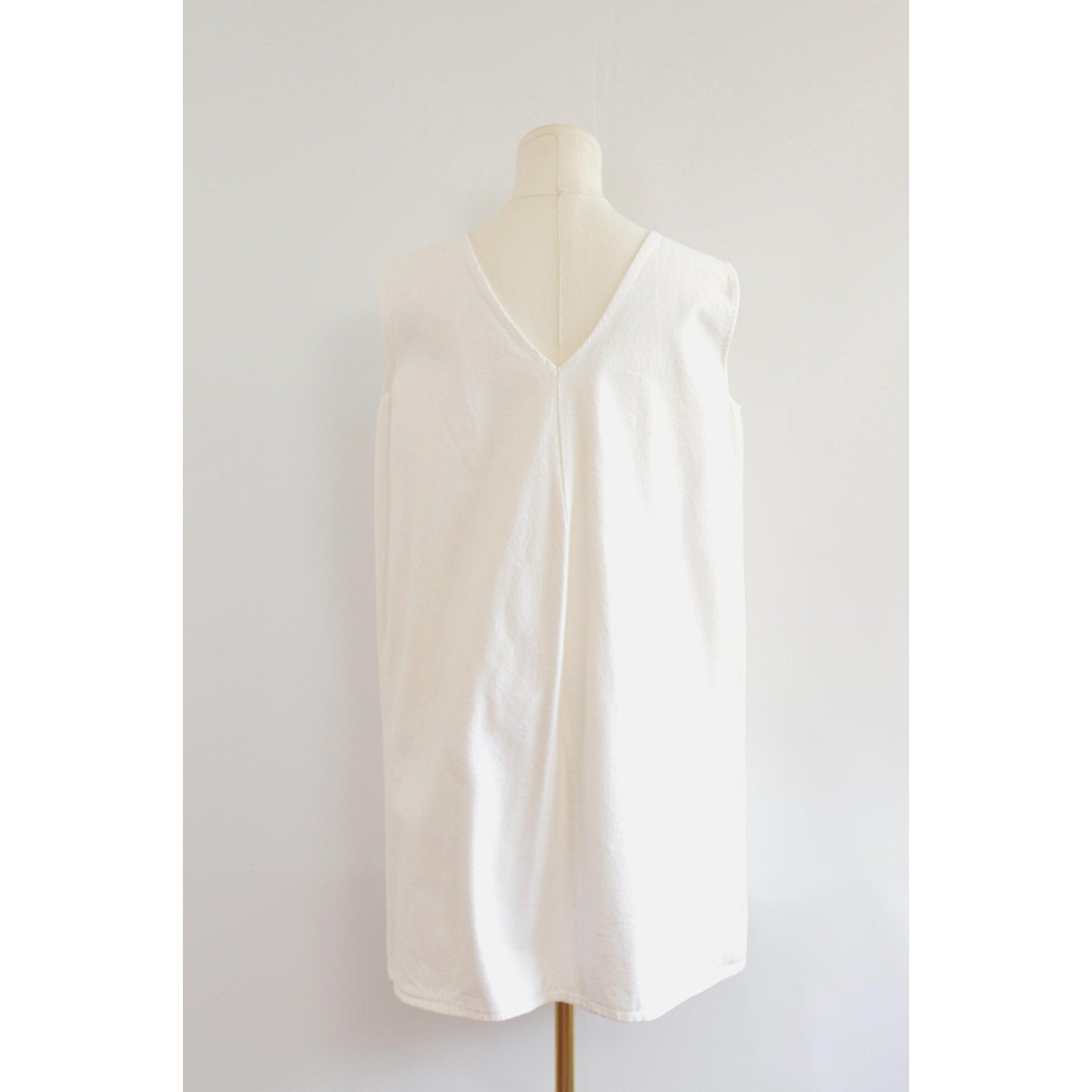 thick structured white denim mini dress