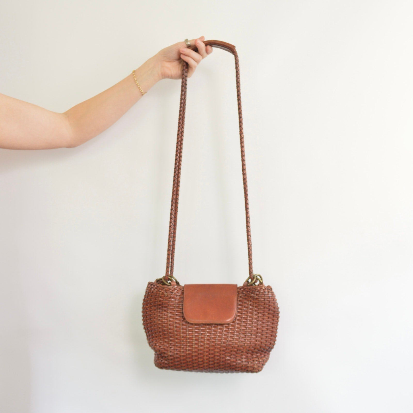 medium cognac brown woven shoulder bag