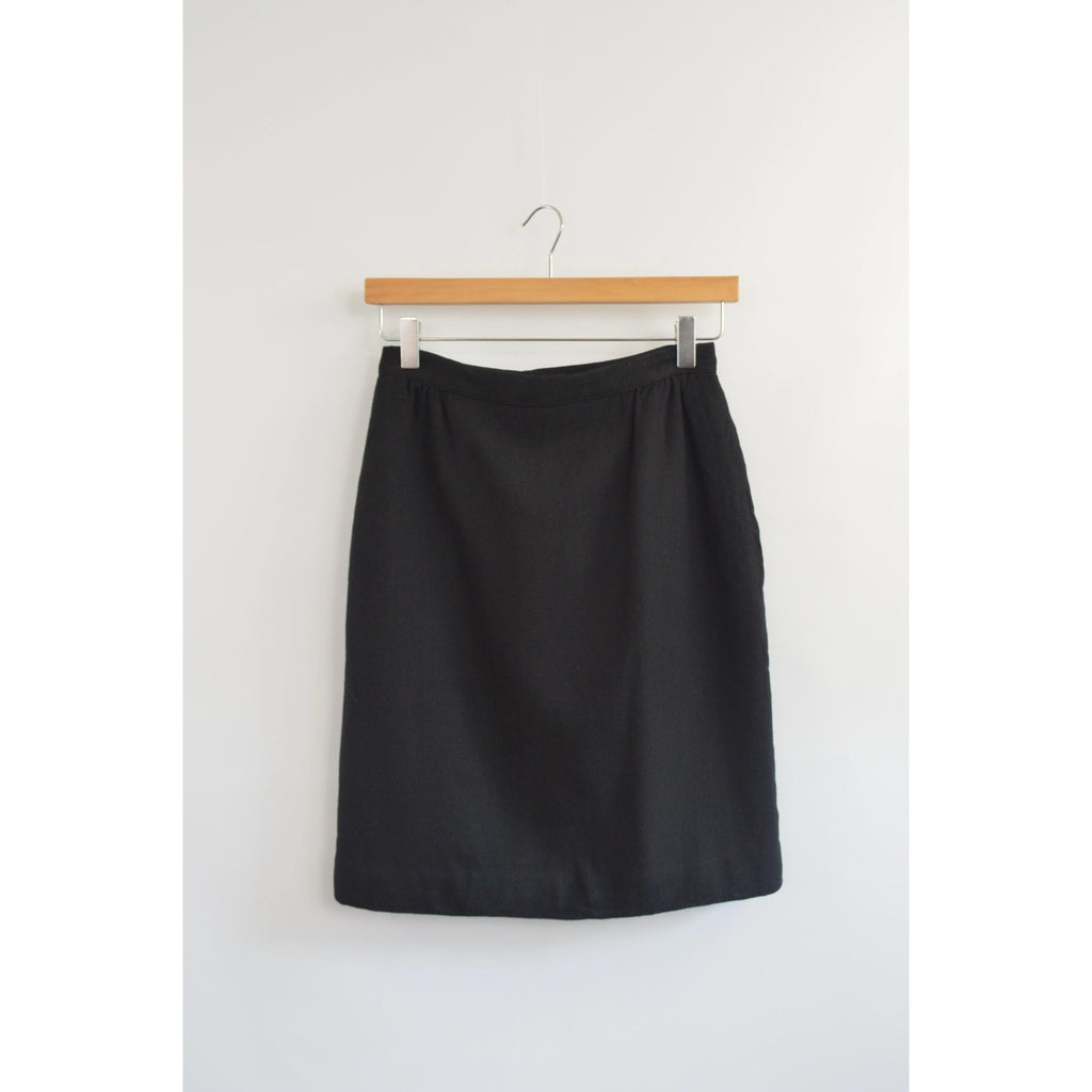 fully lined knee length black wool skirt with pockets