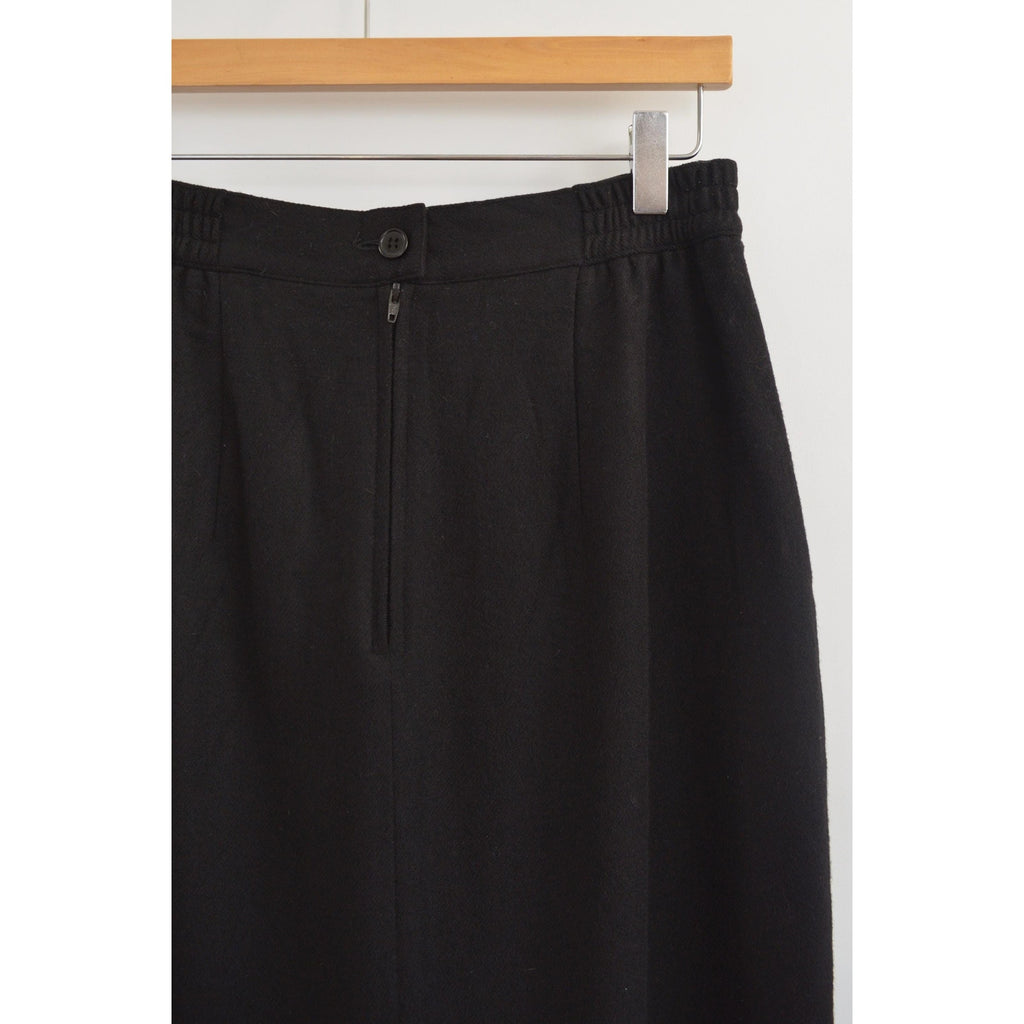 medium black wool midi skirt with off center front slit and full lining
