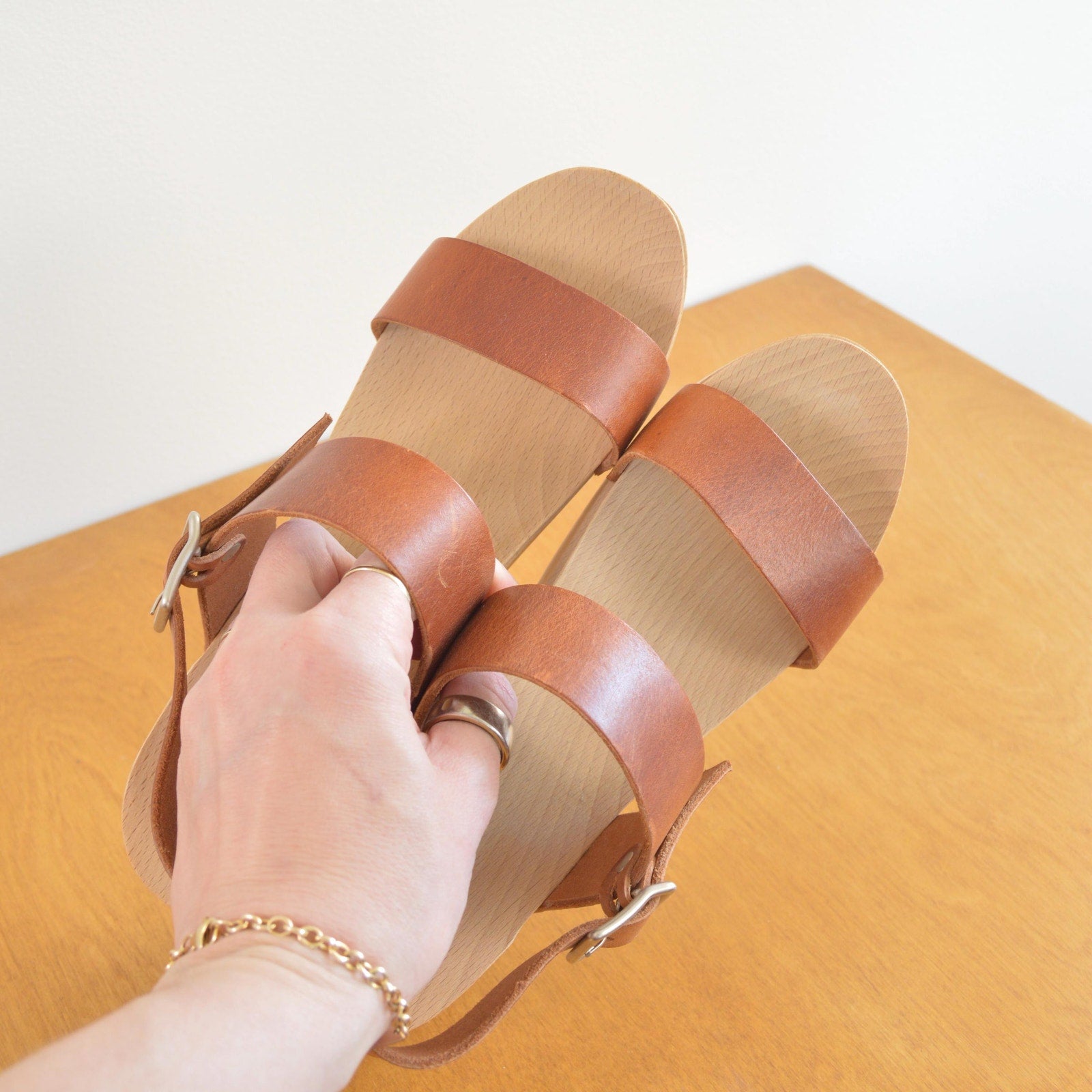 simple two strap wooden and leather clog heels